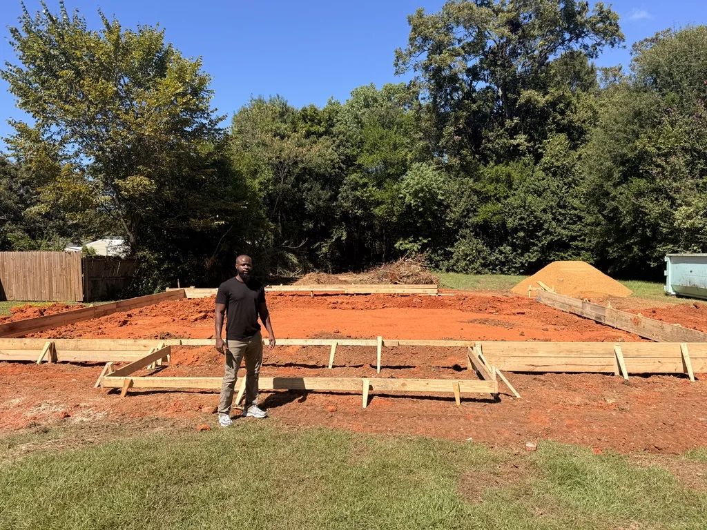 Joe Slone standing in front of the formed Dalraida foundation in Montgomery, Alabama